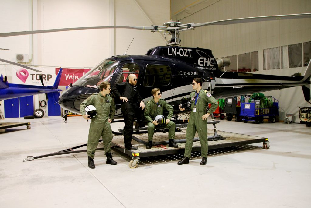 Do we - or do we not have the coolest students ever? Here are four of them, in front of one of our AS350B3, LN-OZT. 